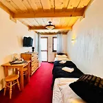 Willa I Karczma Cztery Pory Roku Relaks & Spa Couette-café Kościelisko